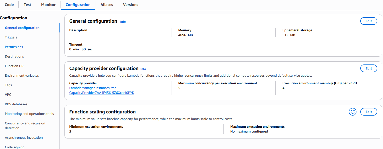 Screenshot of the AWS Lambda console on the Configuration tab showing a function’s Capacity provider configuration (max concurrency per execution environment = 5, execution environment memory = 4 GiB per vCPU) and Function scaling configuration (minimum execution environments = 3)