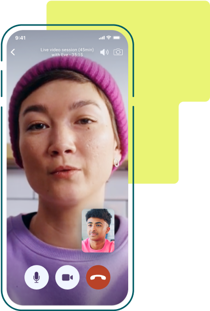 Smartphone screen showing a live video call between a woman wearing a purple beanie and a man in a pink shirt, with call control icons at the bottom.