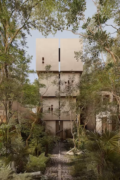 Venta de departamentos en Tulum con el torre mirador, ofreciendo vistas encima de la copa de árboles.