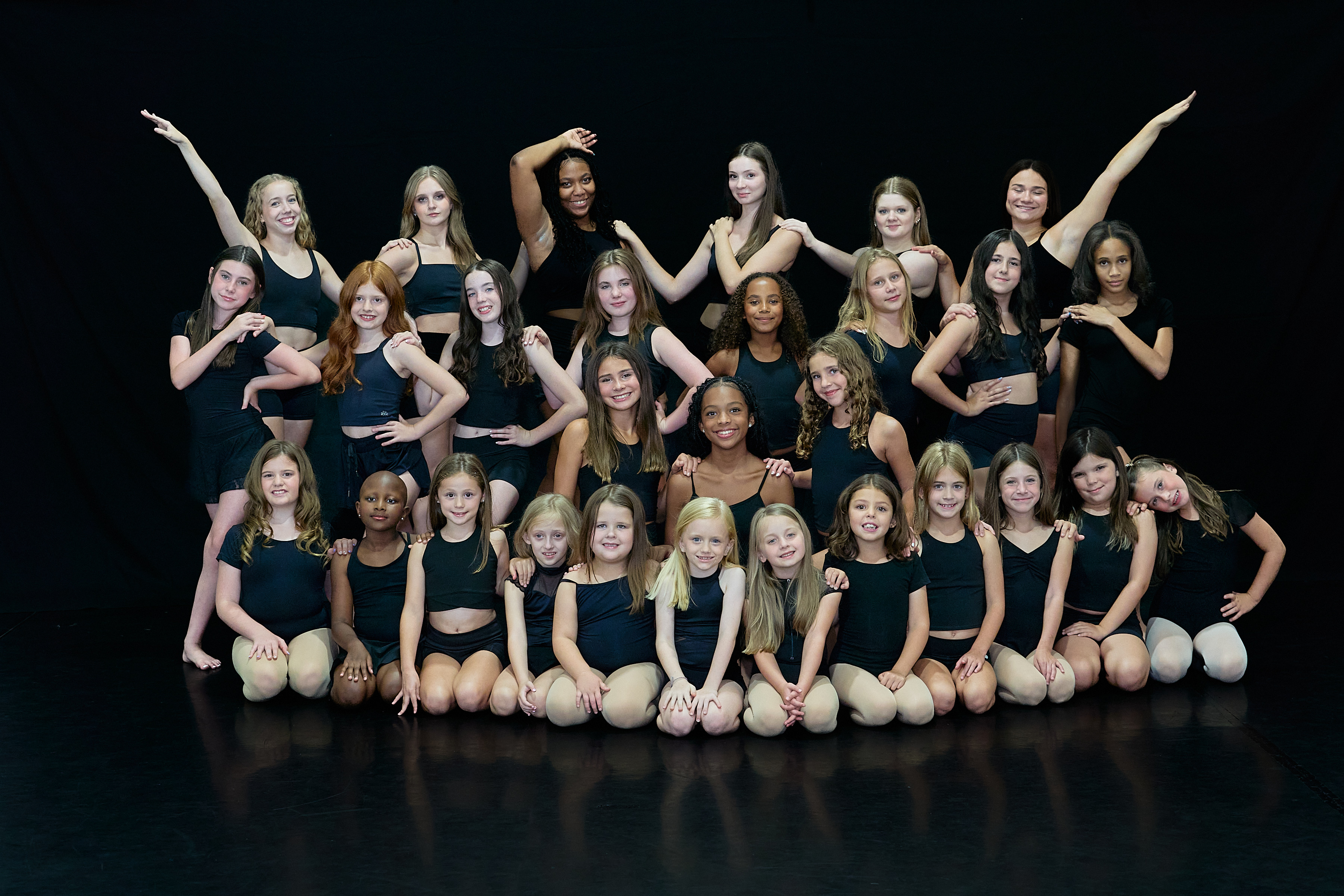 The 5678 Dance Performance Company dancers pose.