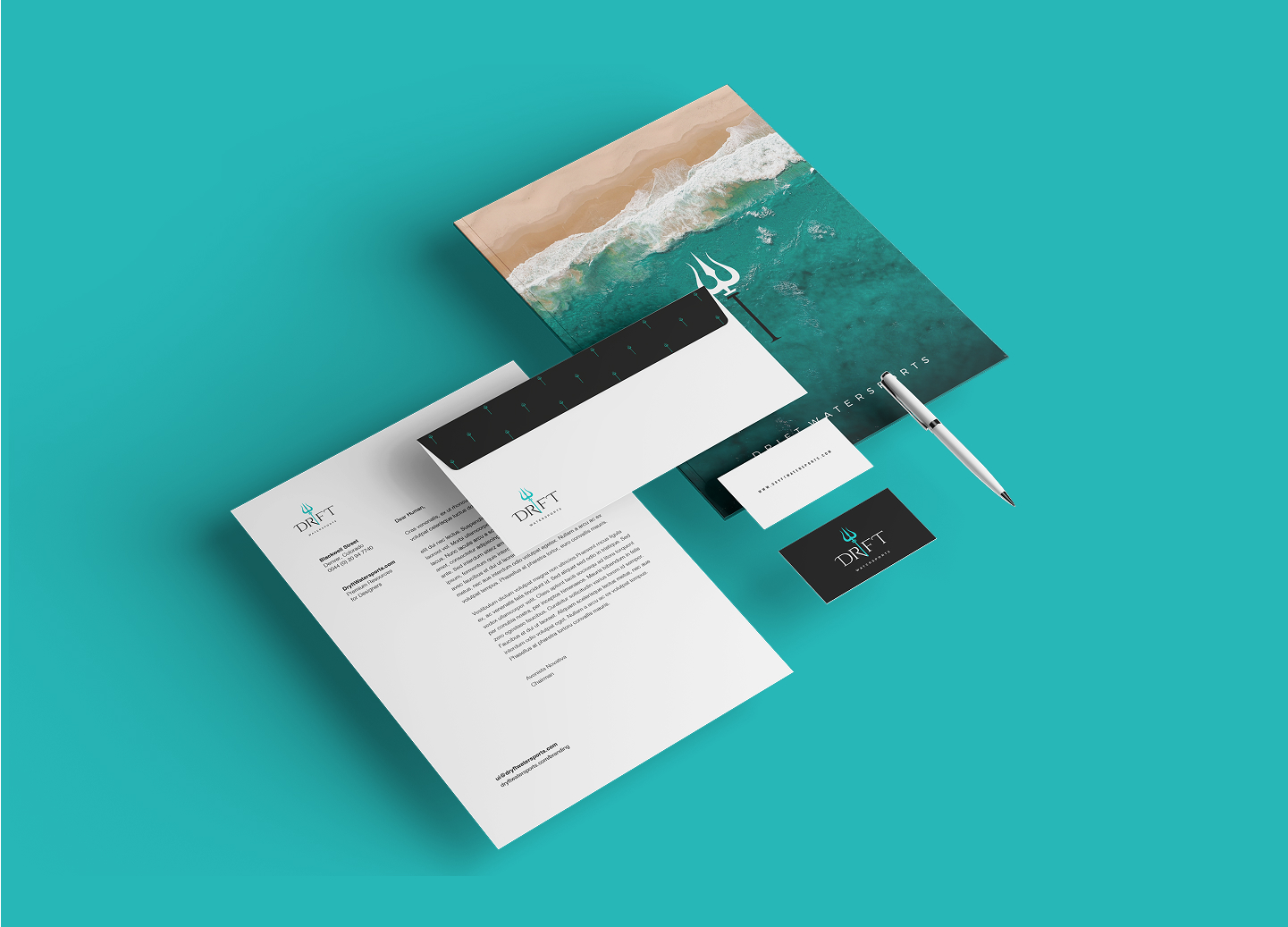 Branded stationery set on teal background including letterhead, envelope, business cards, pen, and folder with ocean wave design.