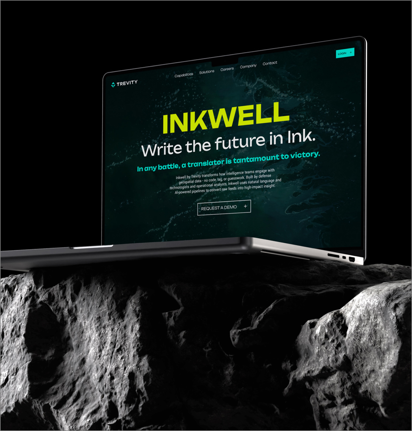 Laptop displaying Trevity's Inkwell website screen with tagline 'Write the future in Ink' on a rocky surface against a black background.