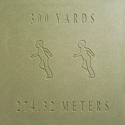Herrera Elementary School | Houston, TX | Architect: TF Harper | Design Shown: Jogging Trail "300 Yards" Marker Paver