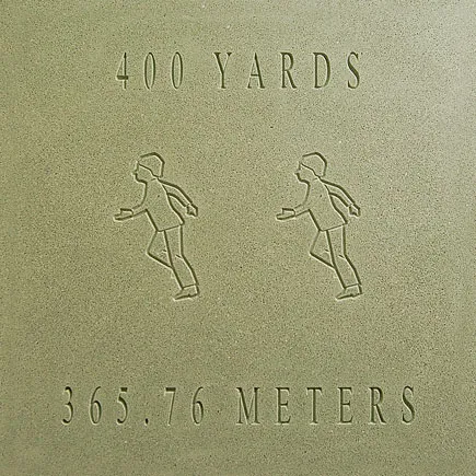 Herrera Elementary School | Houston, TX | Architect: TF Harper | Design Shown: Jogging Trail "400 Yards" Marker Paver