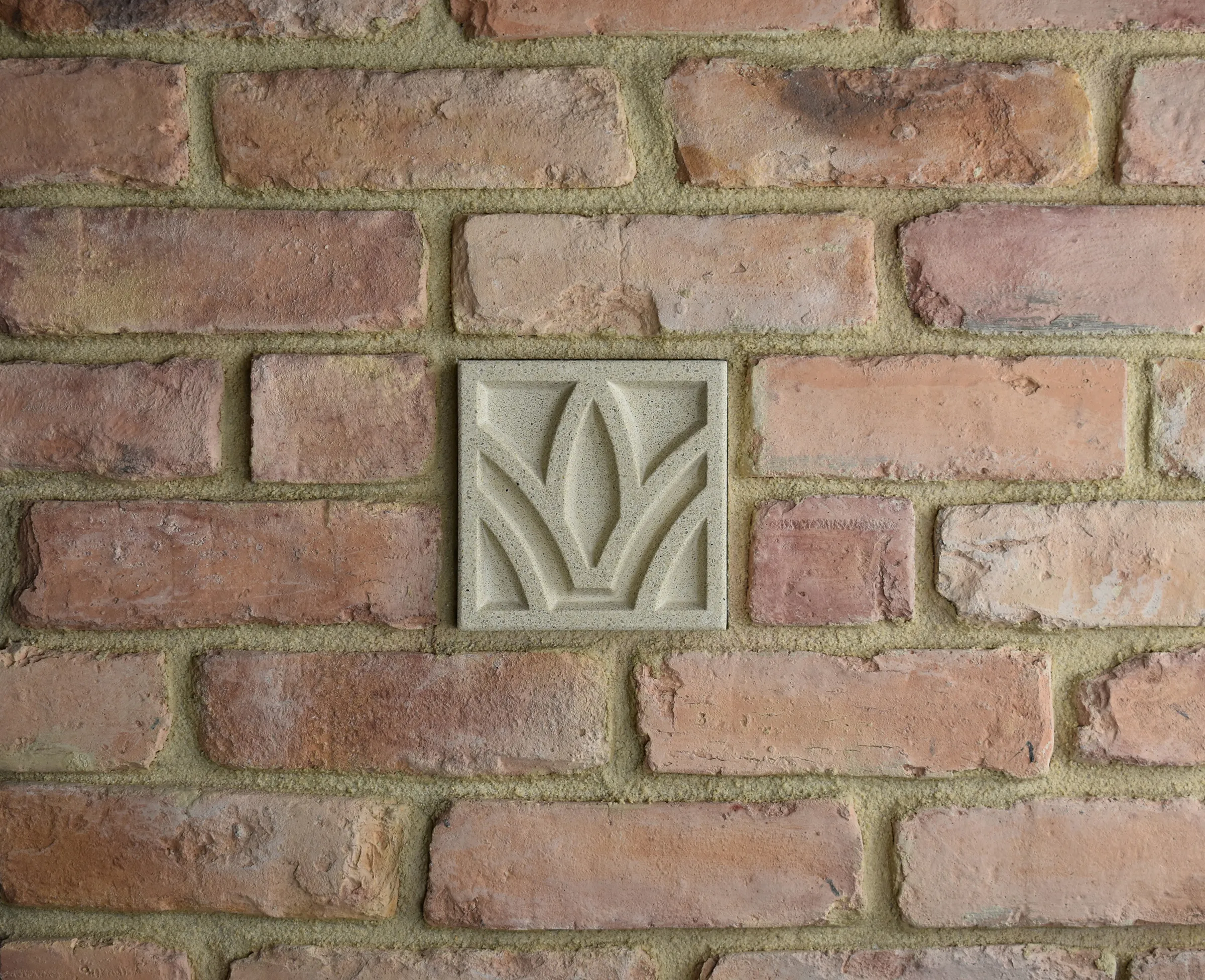 Arch & Dart Bas-Relief Cast Stone Masonry Insert Wall Accent by Pineapple Grove Designs

