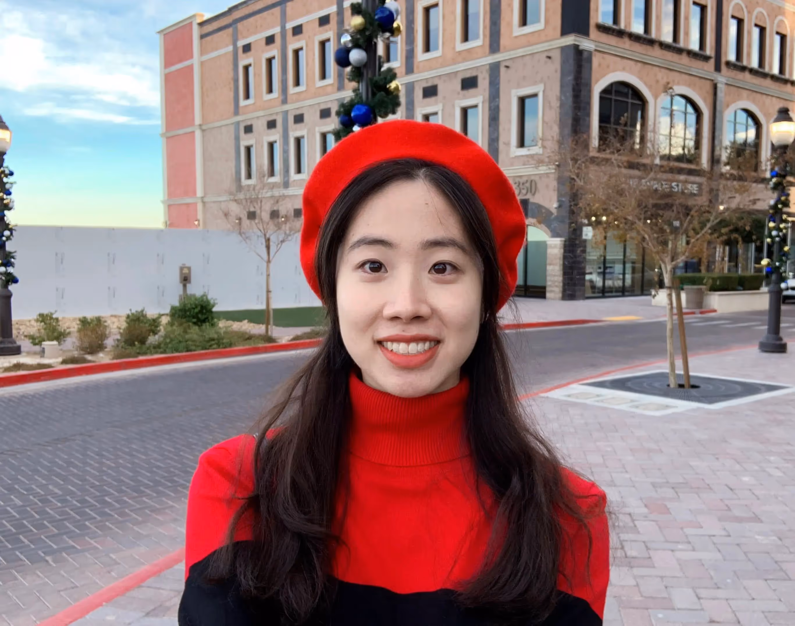 A woman wearing a red hat and a red sweater. - Assistments - Formative Assessment Solutions