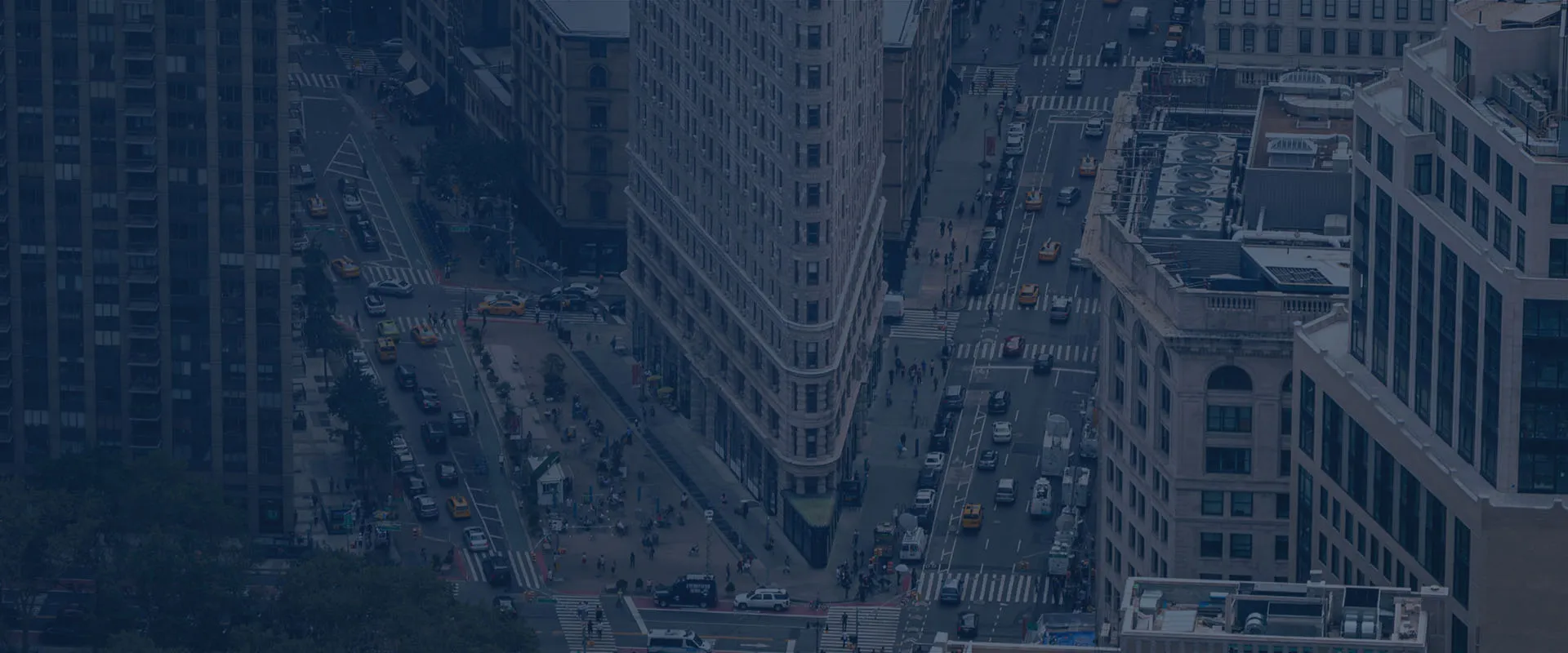 Busy Manhattan New York City streets surrounding the Flatiron building