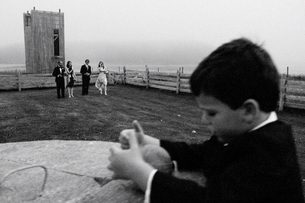 moody black and white wedding photods with bride and groom outside at auberge des gallants