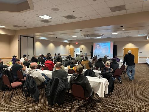 concrete pump truck with American flag decal
