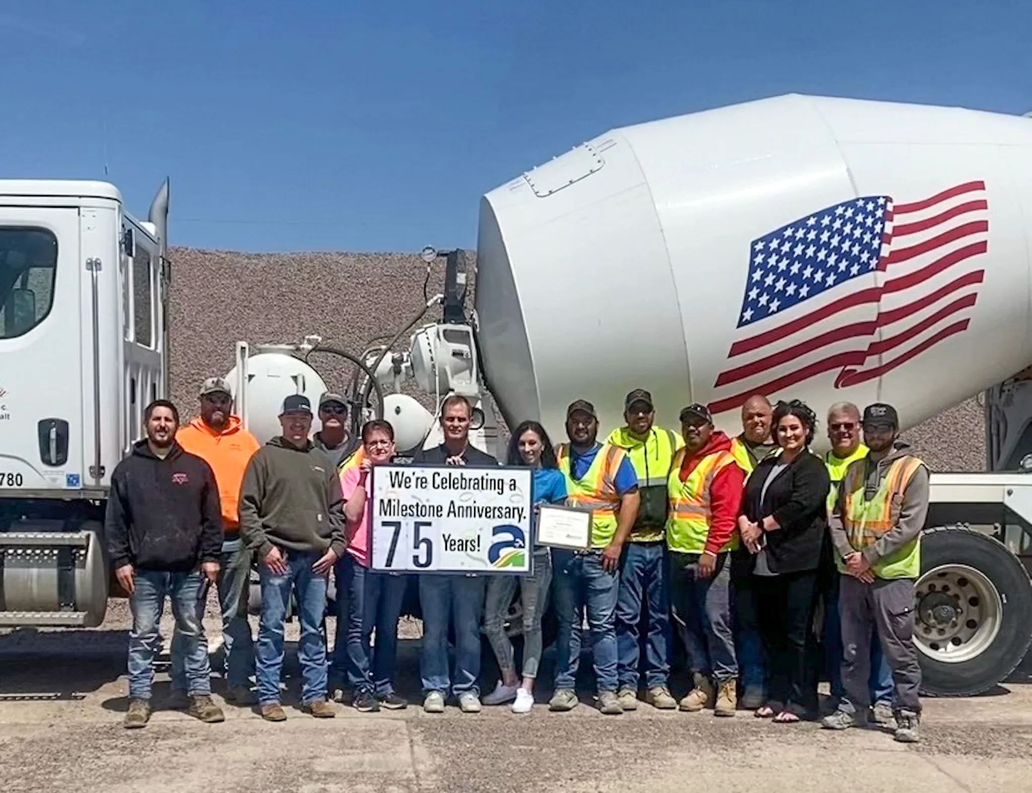 concrete pump truck with American flag decal