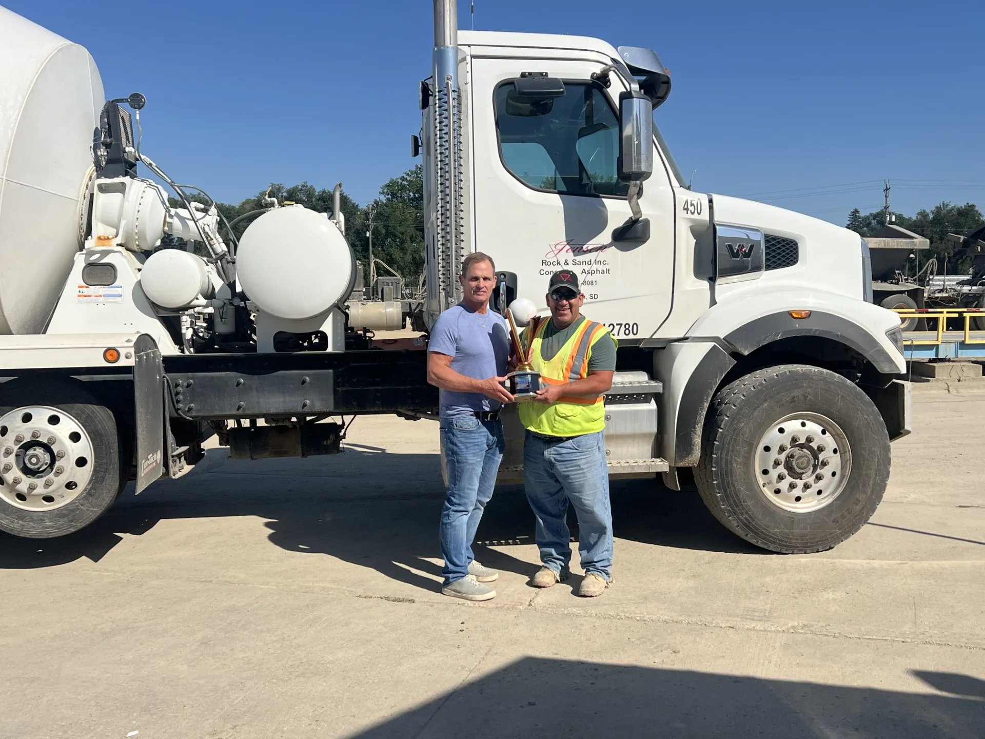 concrete pump truck with American flag decal