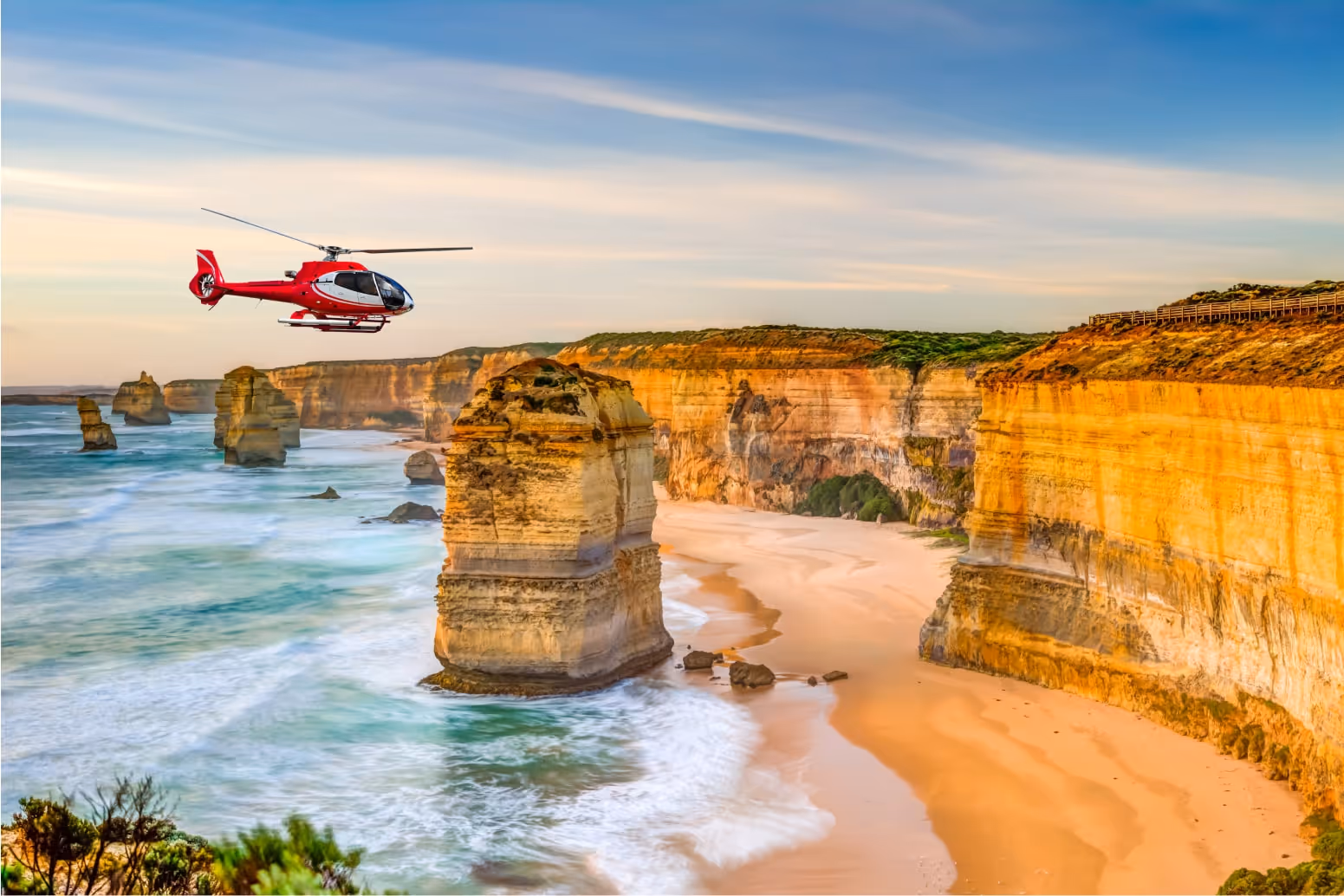 Helicopter flying over The 12 Apostles