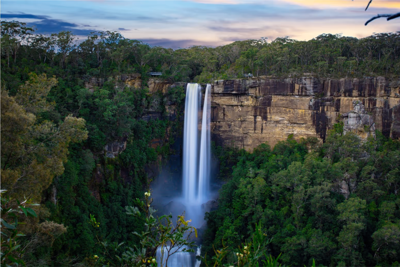 A beautiful waterfall and green landscape