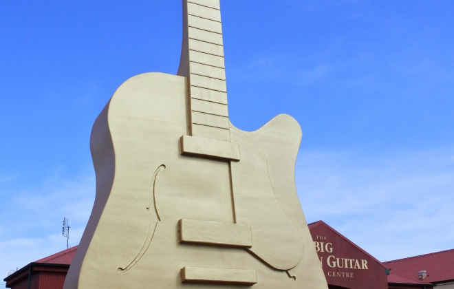 The Big Golden Guitar monument outside the tourist centre in Tamworth, New South Wales.