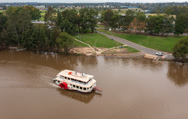 Aerial view of the Nepean Belle Paddlewheeler cruising along the Nepean River.