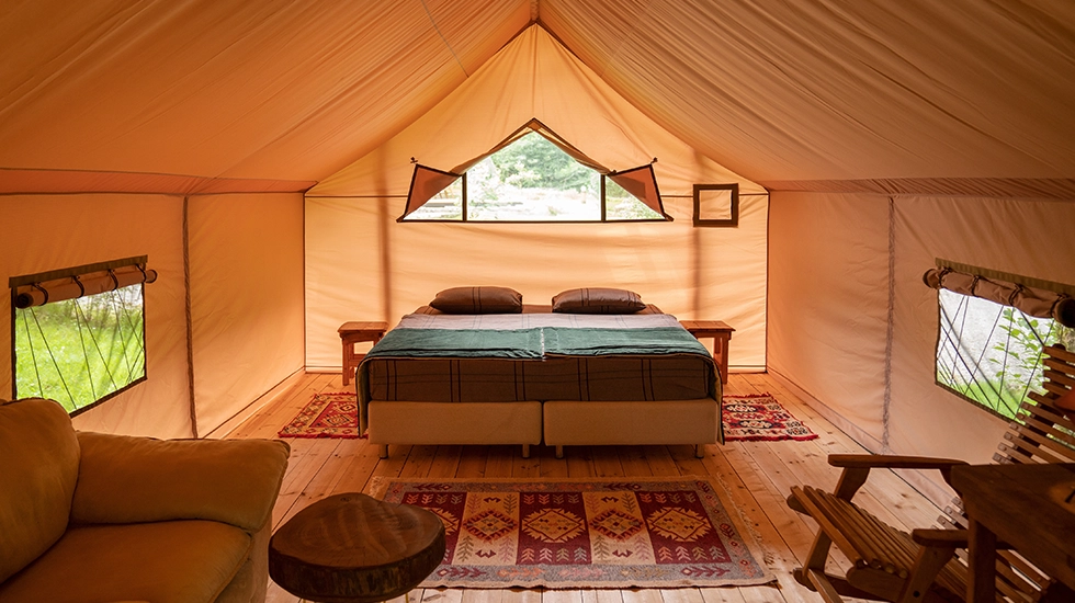 Luxury glamping tent interior in Longreach, Queensland.