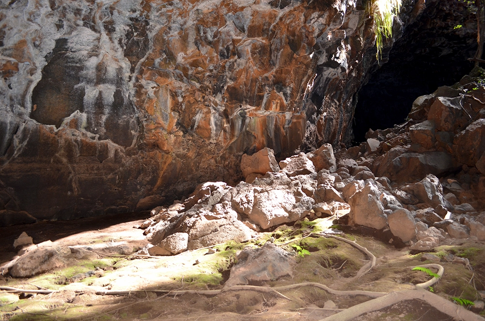 Rock formations and cave entrance inside the Undara Lava Tubes in Queensland.