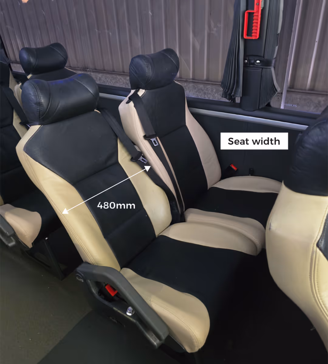 Gold Class coach seat with annotation showing seat width of 480mm