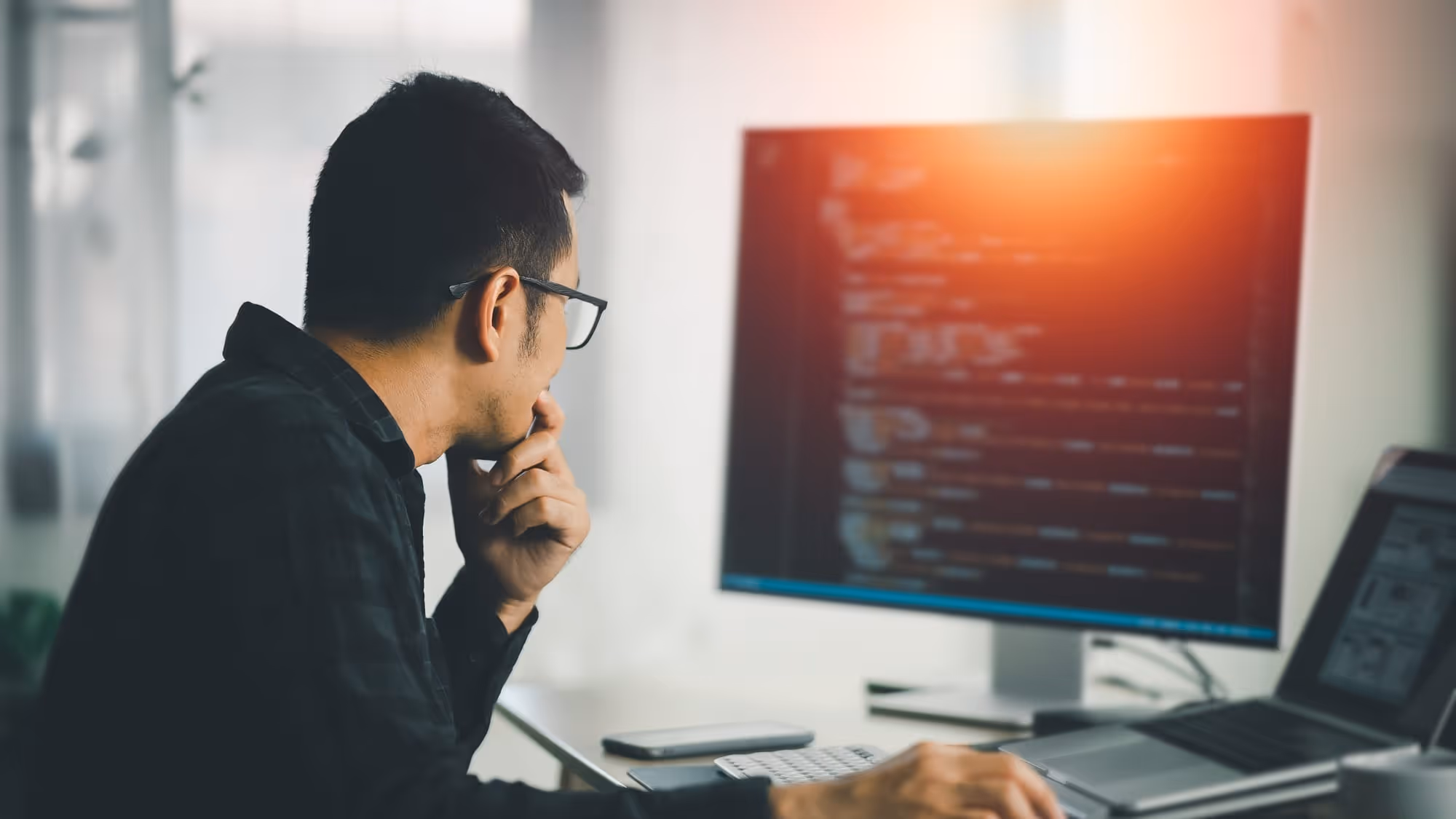 Programmer working on web application development