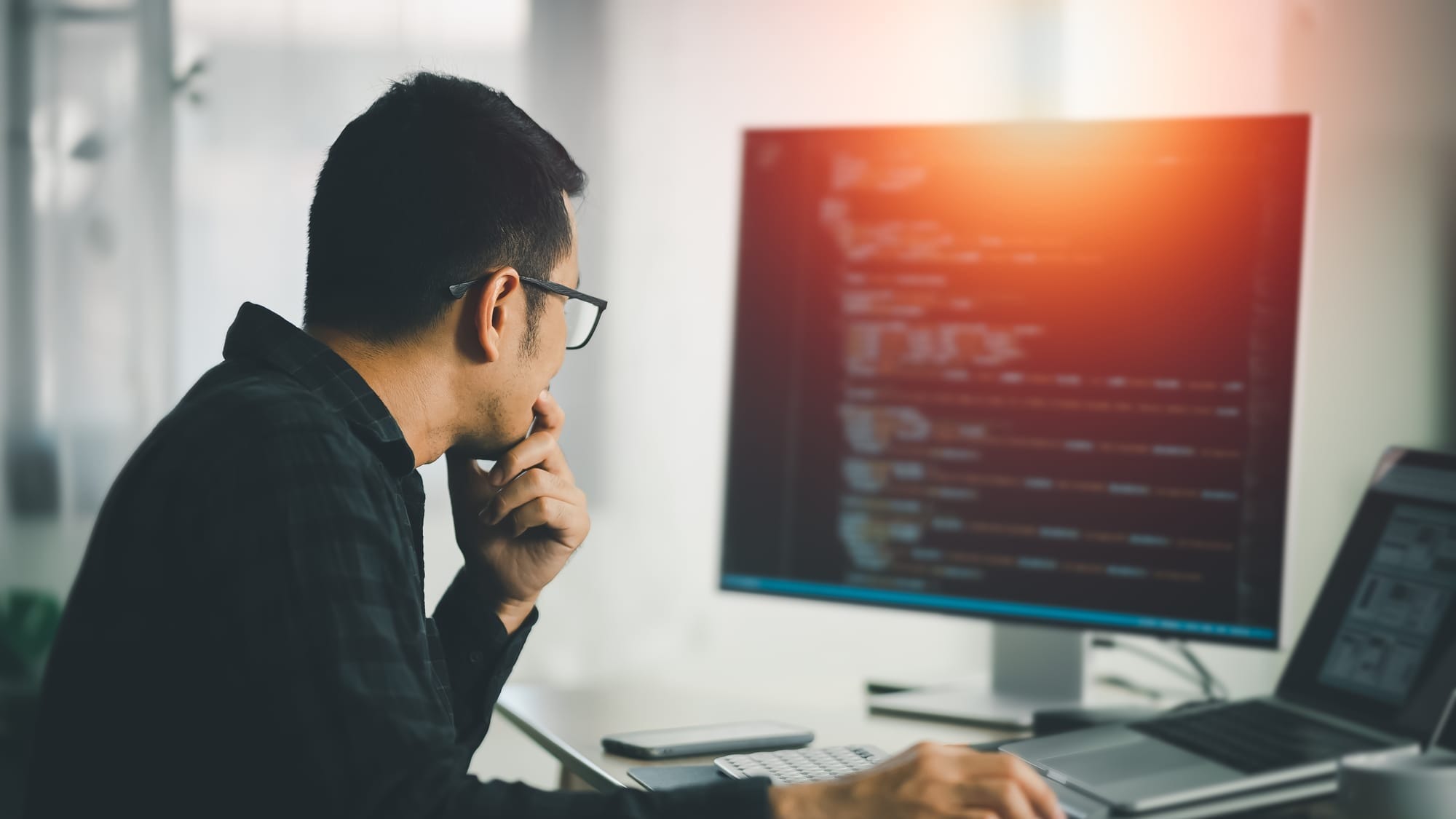 Programmer working on web application development