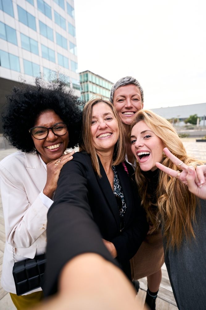 A happy work team getting together after work.