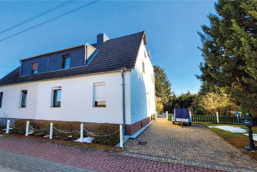 Doppelhaushälfte in Barleben mit Wintergarten, gr. Terrasse sowie weitläufigem Garten
