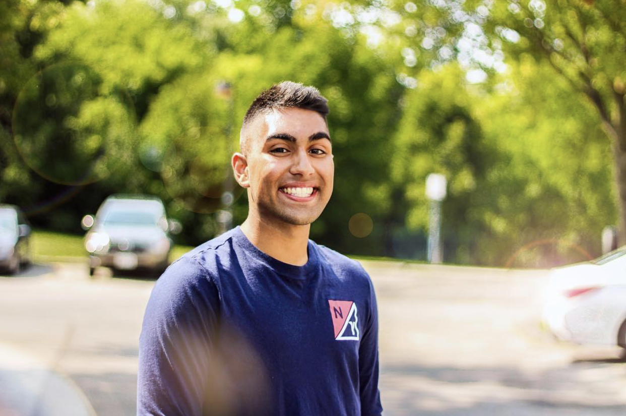 Hero image of Rikin smiling.