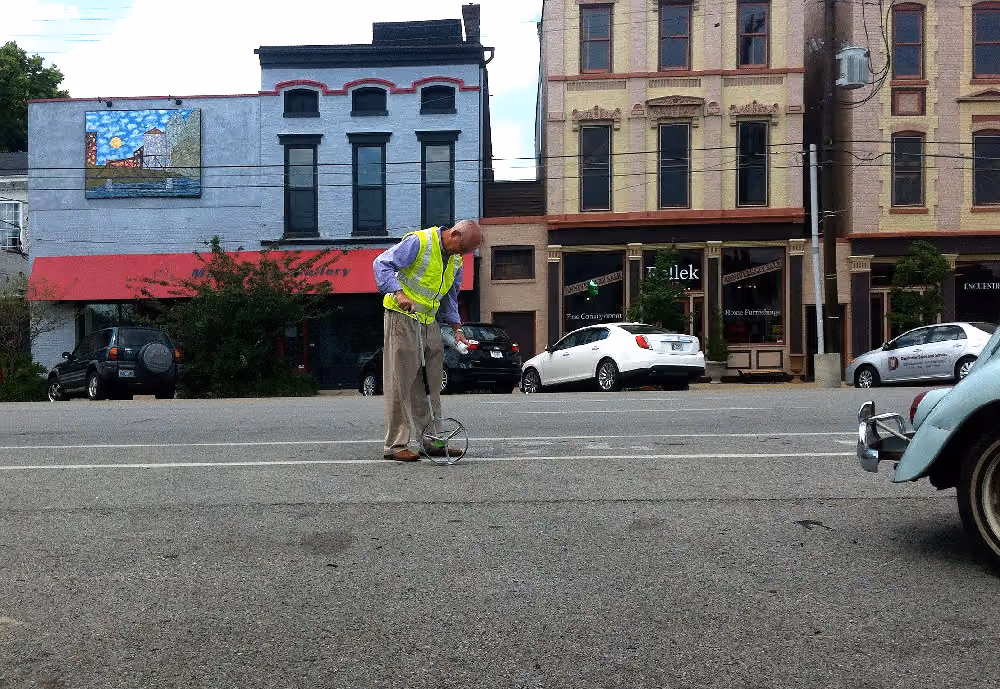 Dirk of public works marking locations for reverse angle parking
