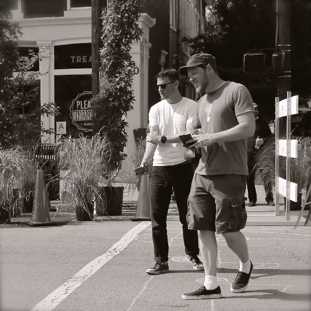 mike lydon and patrick piuma review progress of tactical urbanism install