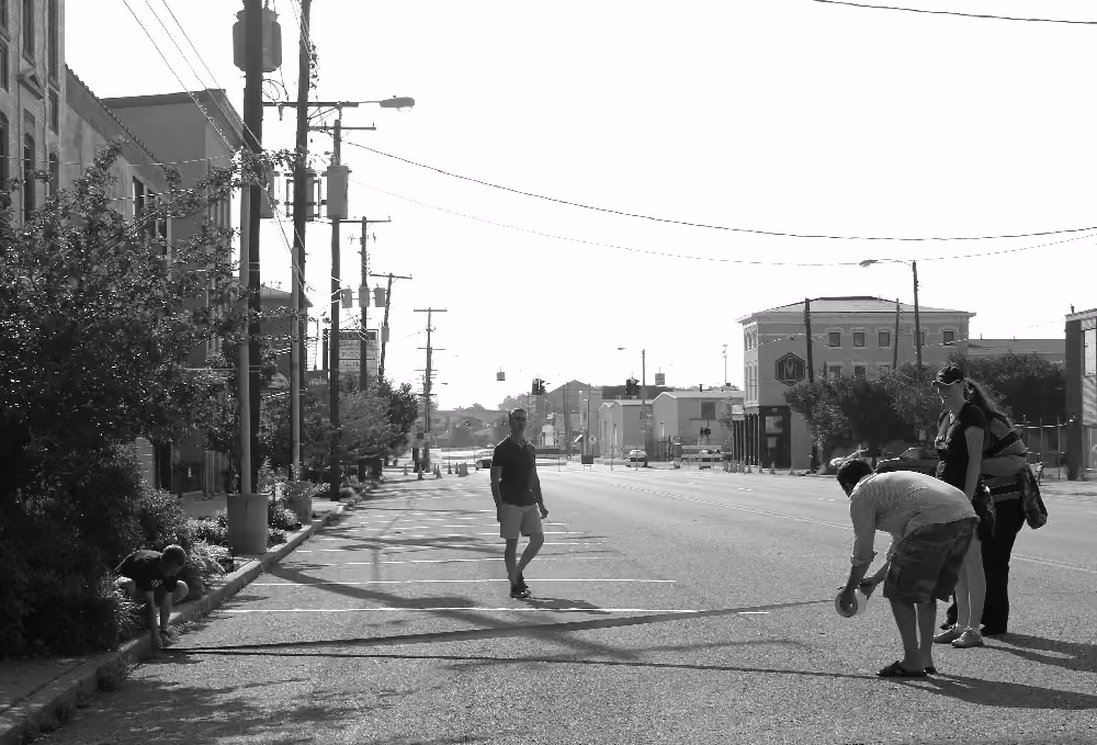 volunteers installing reverse angle parking demonstration