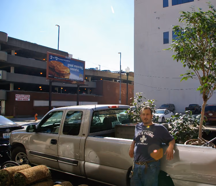 Ramsi Kamar delivering some plant material to use during Park(ing) Day 2010