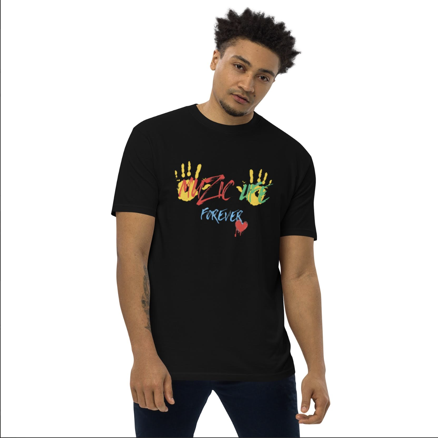 Man wearing black t-shirt with colorful handprints and text 'MUSIC LIFE FOREVER' along with a red heart graphic.