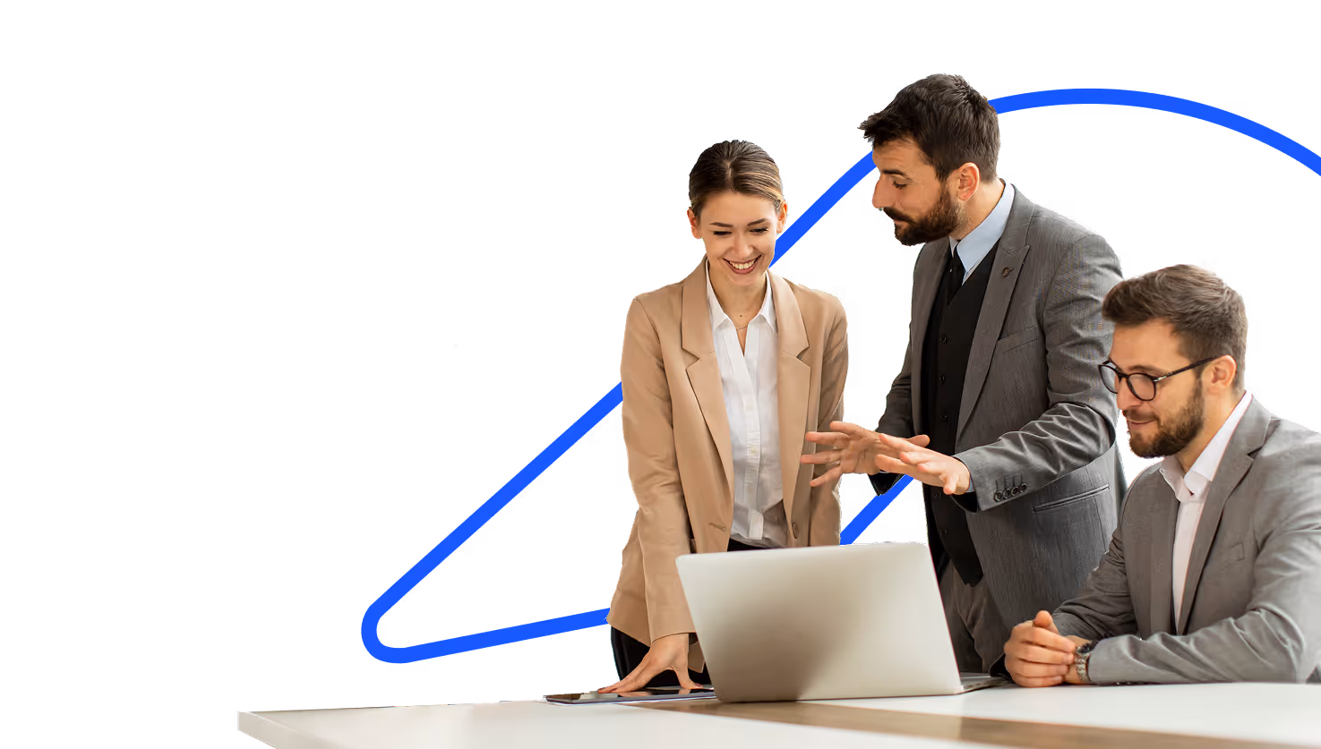 Three business professionals in suits gathered around a laptop, engaged in discussion.