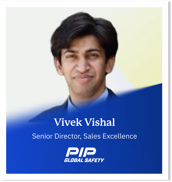 Portrait of Vivek Vishal, Senior Director of Sales Excellence at PIP Global Safety, with a blue company-branded backdrop.