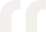 Stylized cream-colored quotation marks on a white background.
