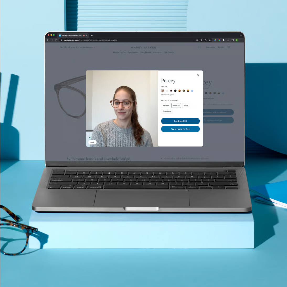Warby Parker virtual try-on showing eyeglasses rendered on a shopper's face with colour and width options
