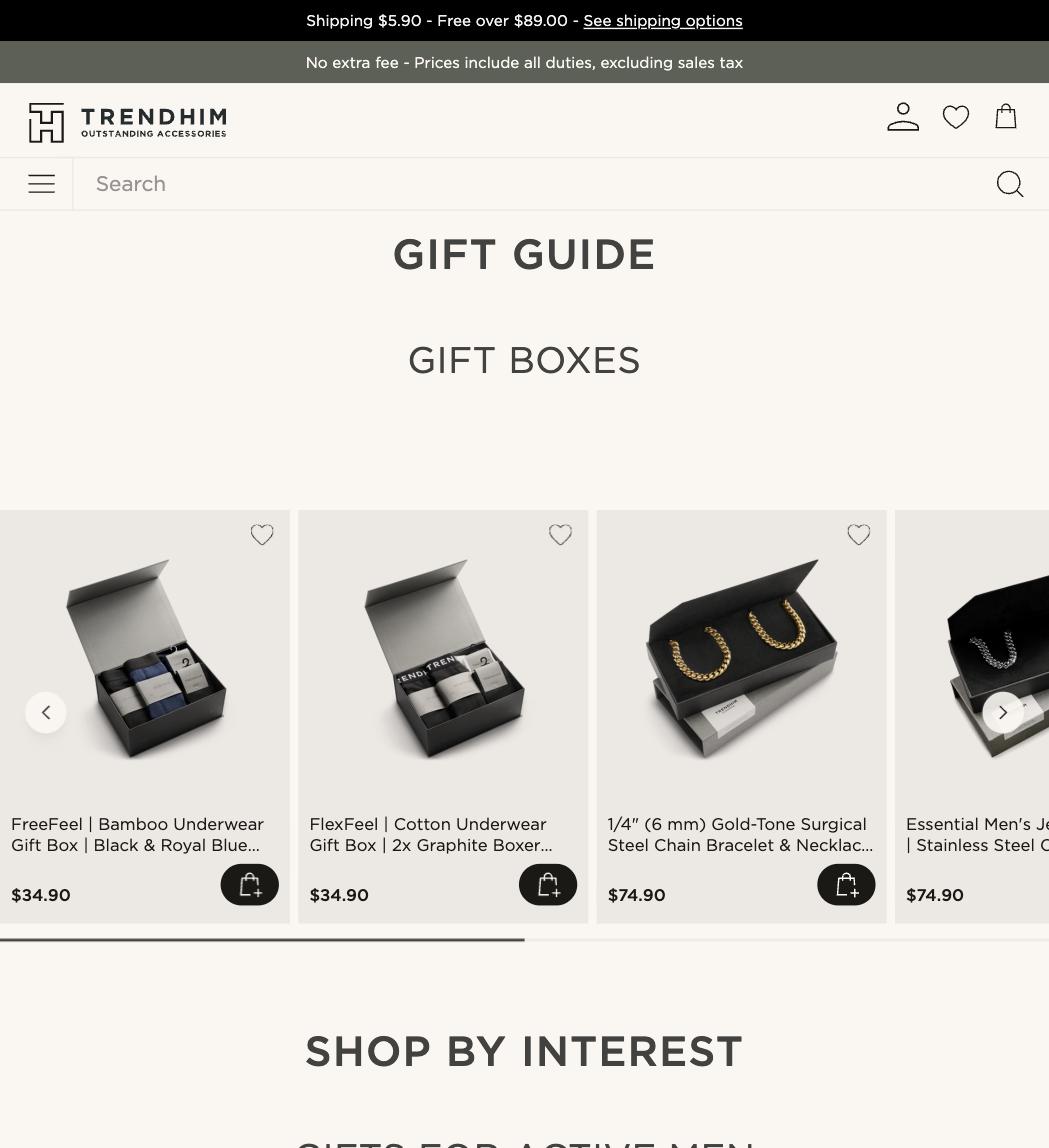 Trendhim gift guide page showing curated gift boxes and Shop by Interest categories for active men, professionals and travellers