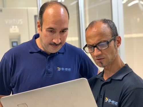 Nameer and Gomes reading the network plan