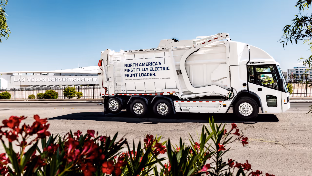 McNeilus 2025 Waste Expo - McNeilus truck with "North America's first fully electric front loader"