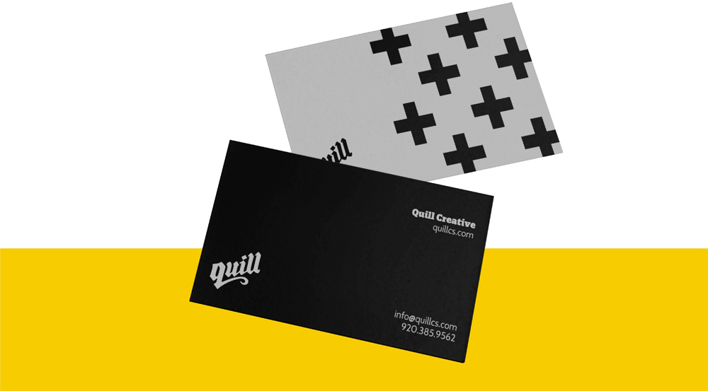 Two business cards, one black with white text showing Quill Creative and contact info, and one gray with bold black plus signs and partial 'Quill' text.