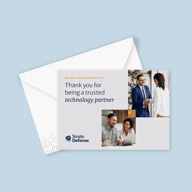 Thank you card from Strata Defense with text expressing gratitude to a trusted technology partner, featuring images of two people shaking hands and a separate image of a man and woman smiling at a laptop.