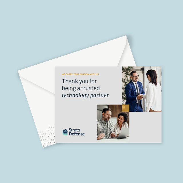Thank you card from Strata Defense with text expressing gratitude to a trusted technology partner, featuring images of two people shaking hands and a separate image of a man and woman smiling at a laptop.
