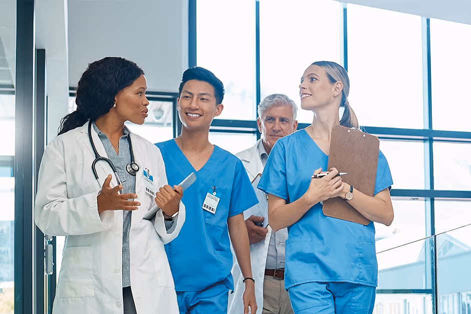 A group of doctors standing around each other