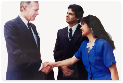41st President George W. Bush shaking hands with Lorri Galloway