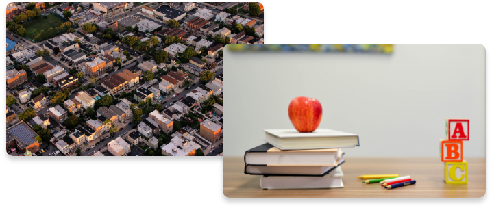 A desktop with a book and apple on top.