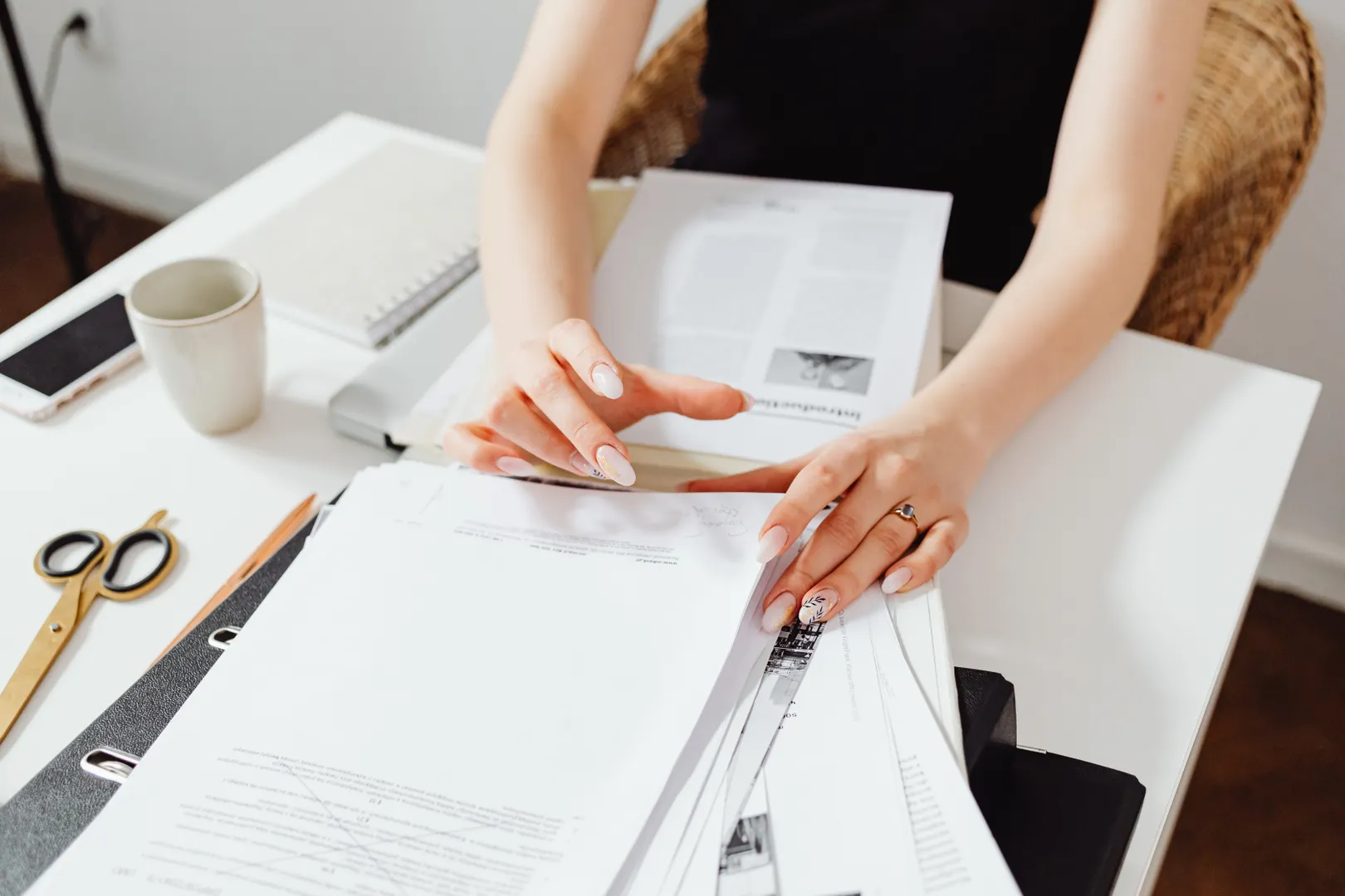Efficient paper organizing and management in a home office setting.