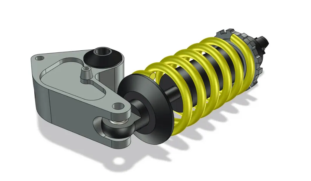 a yellow spring on a metal object