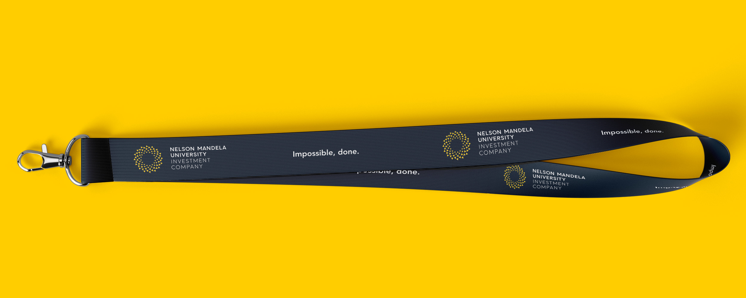Creative Caterpillar client Nelson Mandela University Investment Company lanyard.