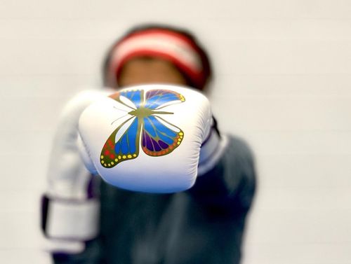 Girl with boxing glove