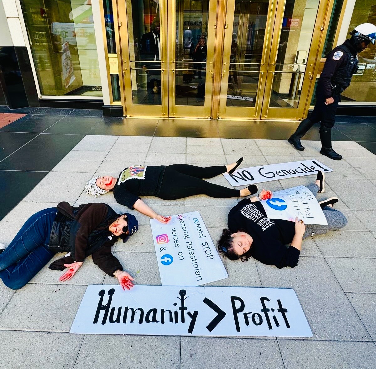 Anti-genocide activists stage a "die-in" outside of Meta office in Washington DC.